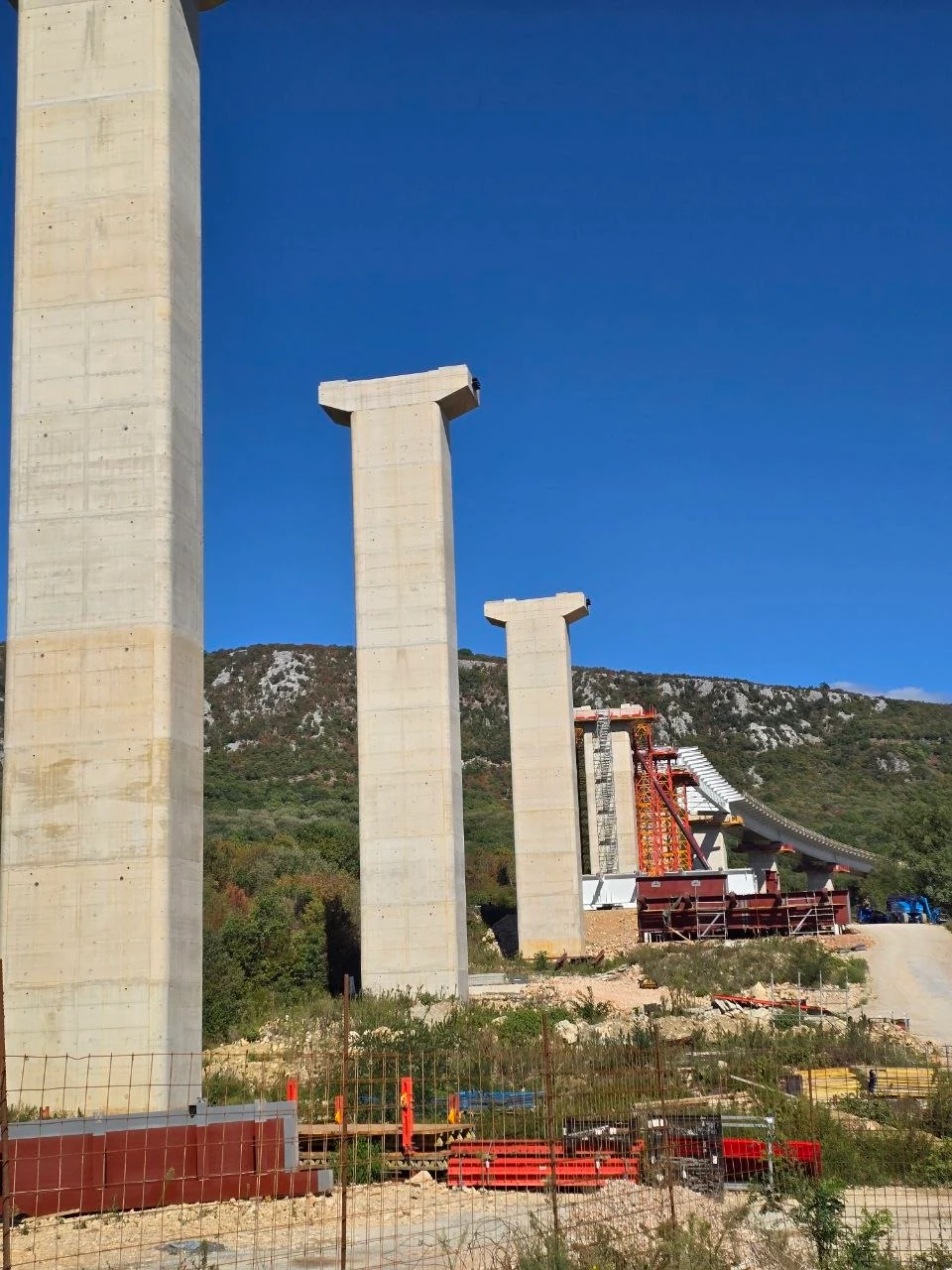 The original photograph of concrete viaduct piers under construction near Novi Vinodolski, Croatia